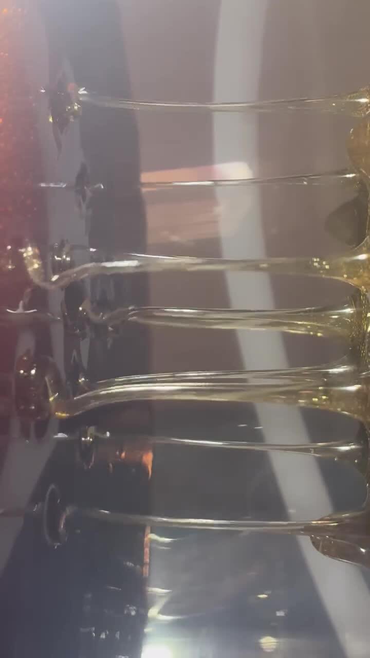 Raw honey being strained into a container